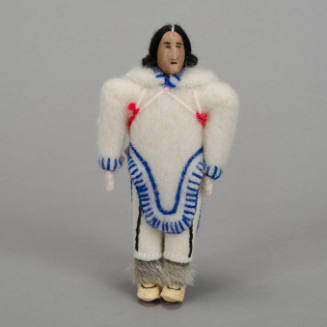 Female in traditional clothing doll