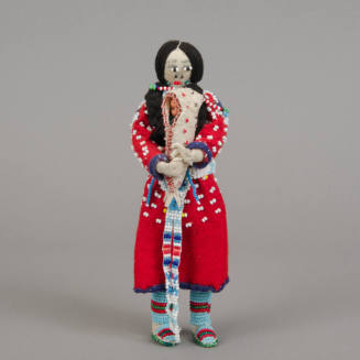 Woman and baby in cradle doll