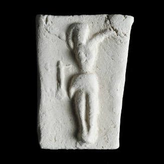 Sacred clay tablet with large crucified figure 