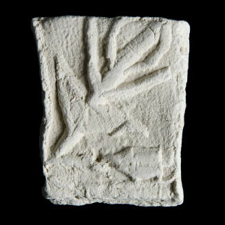 Sacred clay tablet with geometric representation of a plant