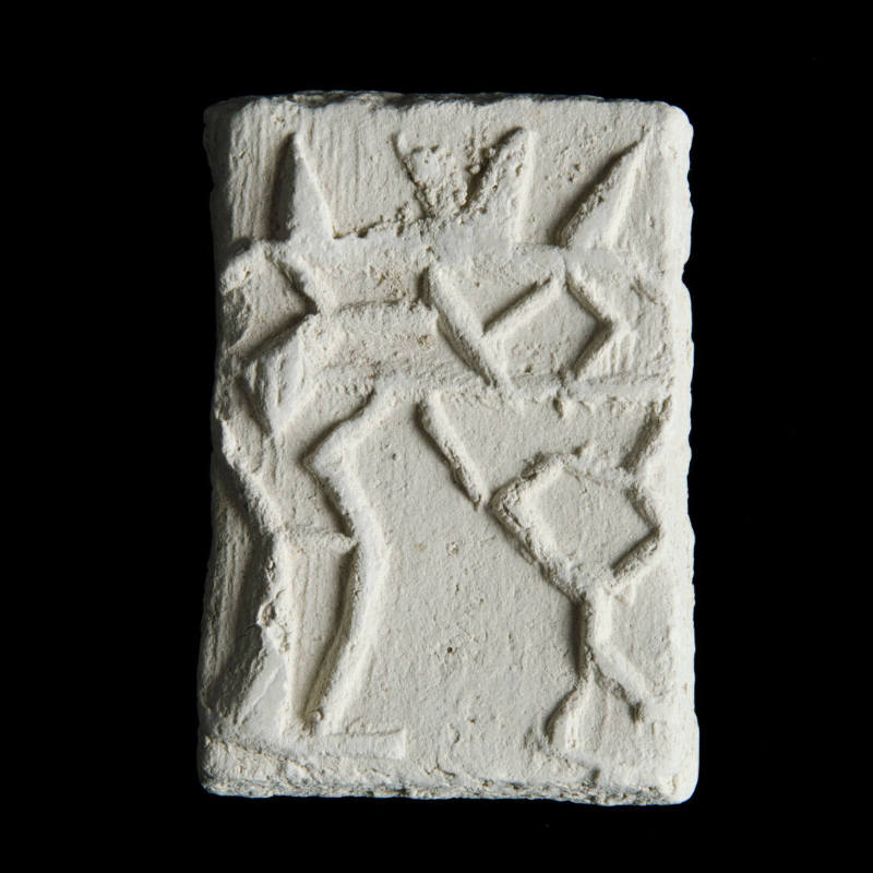 Sacred clay tablet with complex, linear, abstract design