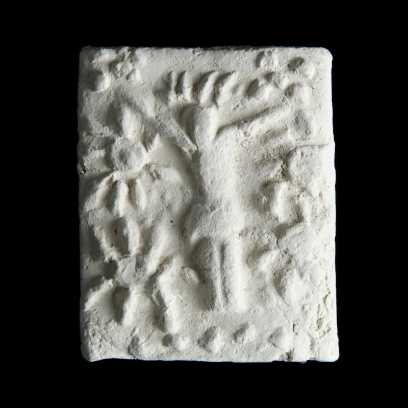 Sacred clay tablet with small crucified figure but no cross