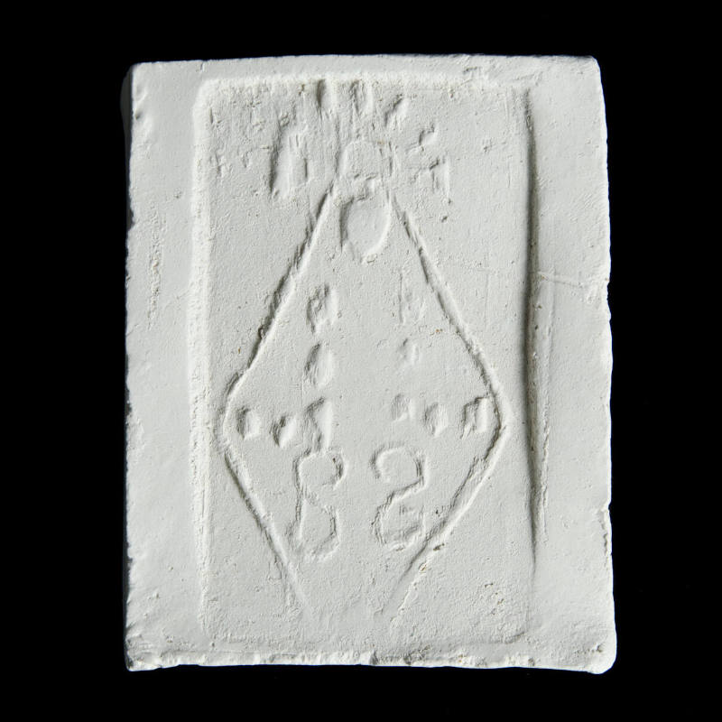 Sacred clay tablet with abstract, geometrical figure of Virgin