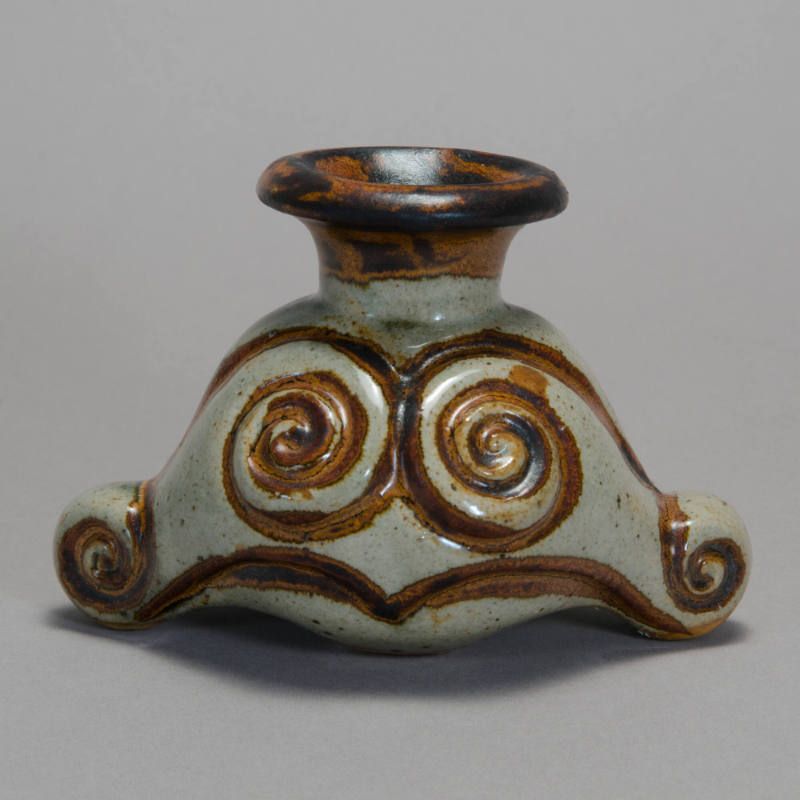 Candleholder with spiral designs