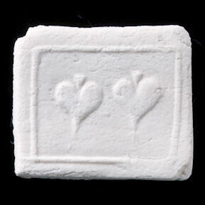 Impressed clay tablet votive offering with pair of hearts