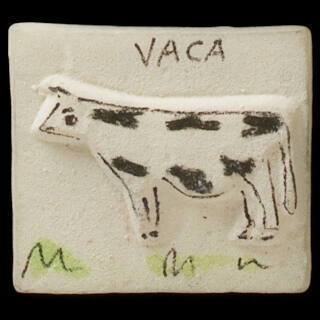 Painted tablet votive offering with cow, reading Vaca