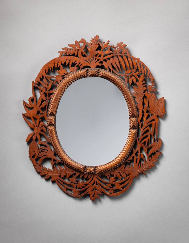 One of a pair of openwork mirrors