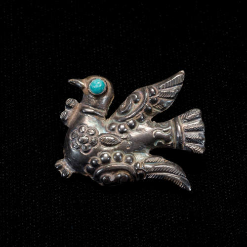 Bird brooch