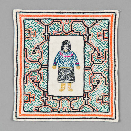 Embroidered textile with woman in traditional dress