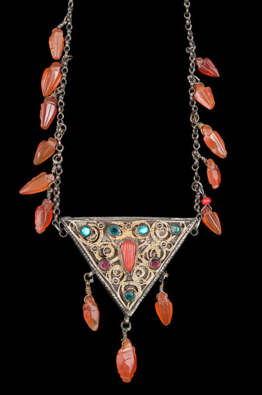 Necklace with triangular amulet