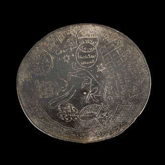 Mystical bowl inscribed with magical motifs and squares containing Arabic writing
