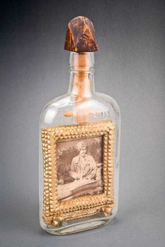 Whimsy bottle with double-sided tramp art frame with portraits of President and Mrs. Coolidge