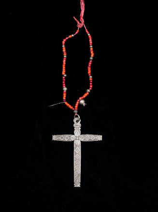 Necklace with incised cross and red trade beads