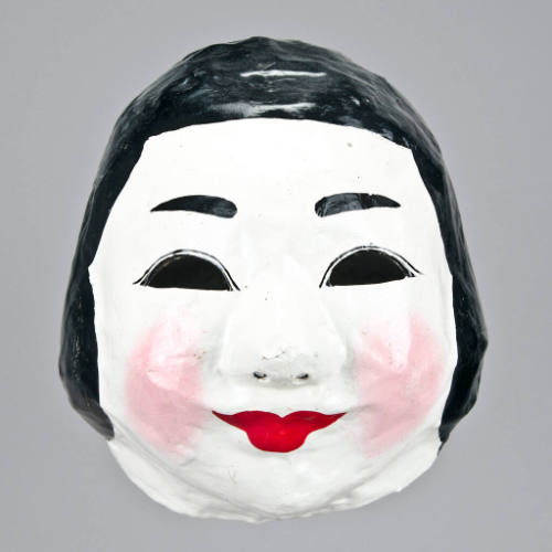 Smiling woman dance mask