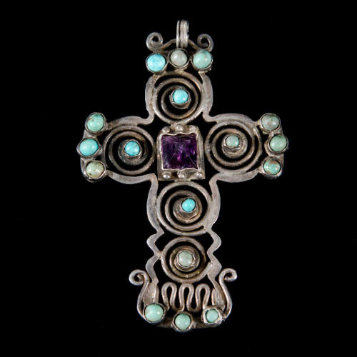 Cross pendant with inlaid stones