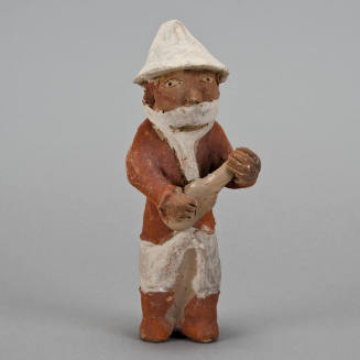 Figural whistle, man with mask and charango