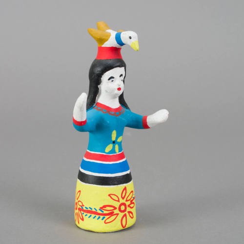 Figure, woman with bird on head