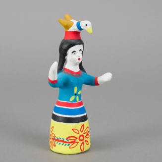 Figure, woman with bird on head