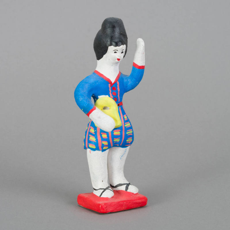 Figure, woman with one raised arm holding bag