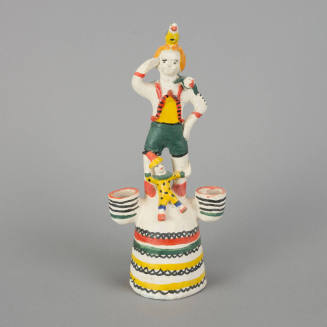 Figure, man with birds and clown standing on dome