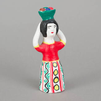 Figure, woman with bowl of fruit on head