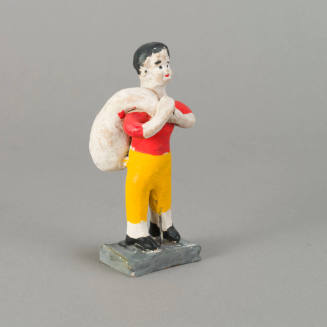 Figure, man with sack on shoulder