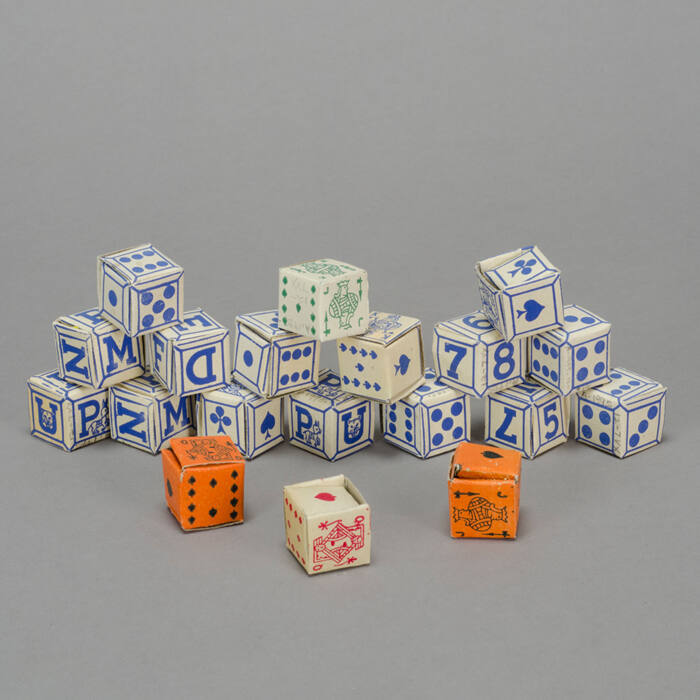 Game with dice and playing cards