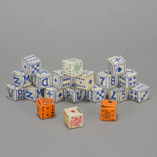 Game with dice and playing cards