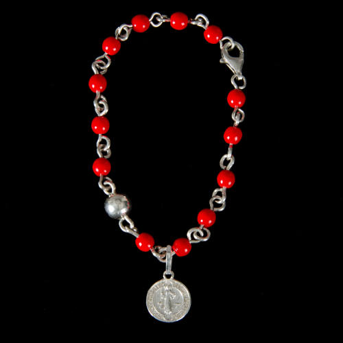 Bracelet for protecting infant with Saint Benedict