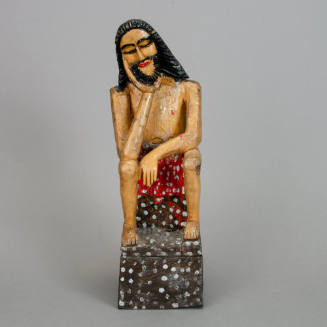 Pensive Christ figurine