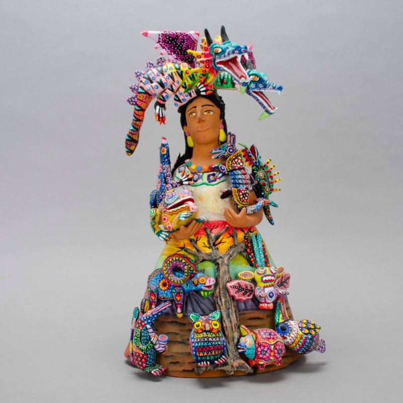 Woman with Naguales (Muñeca)