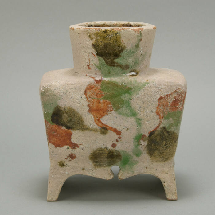 Footed Vessel with a wide neck & colorful glaze