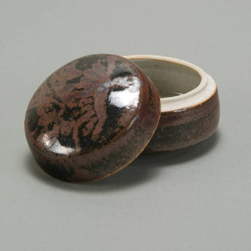 Small, round box with lid