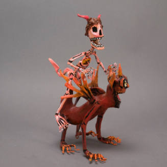 Sculpture, skeleton on devil's back