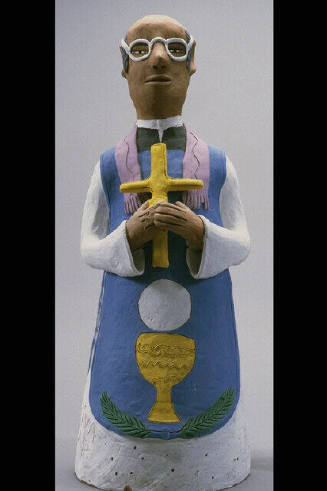 Ceramic Figure Of A Priest