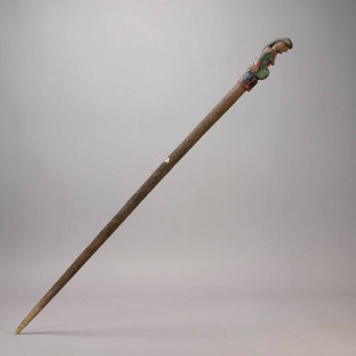 Staff, female figure