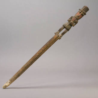 Staff, male figure