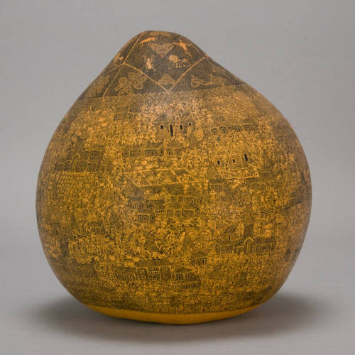 Gourd carved with Peruvian folk scenes