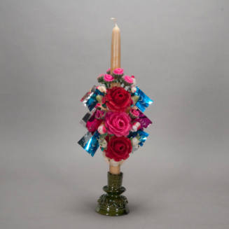 Sculpted candle with base