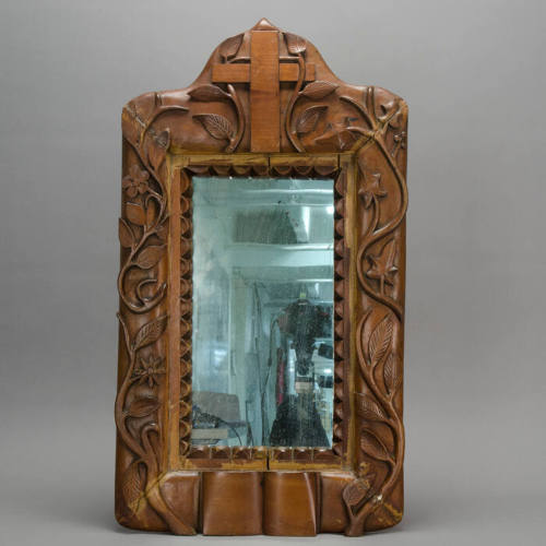 Mirror with carved cross