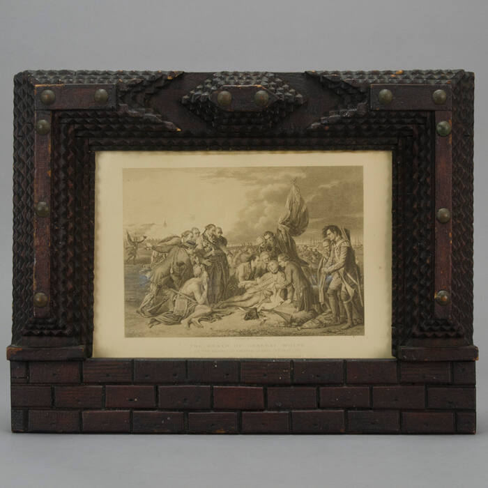 Tramp art frame with American Revolution scene