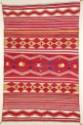 A classic style Navajo blanket. Colors are red, yellow, light green, dark blue, white; made of …