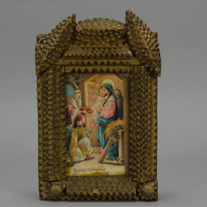 Tramp art gold frame with Nativity postcard