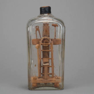 Cross in bottle