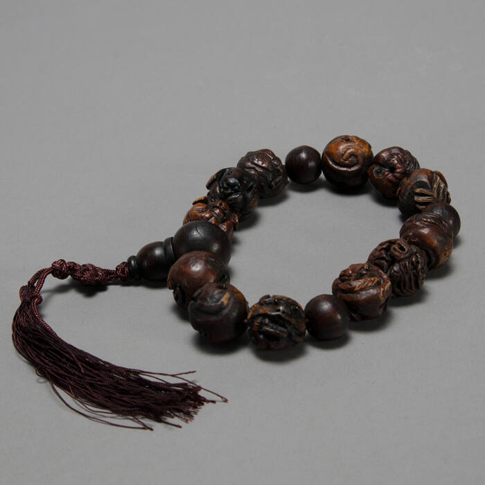 Carved nut bracelet