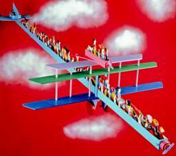 Sculpture of an airplane and passengers.  A painted wood ceiling-suspended sculpture by William…