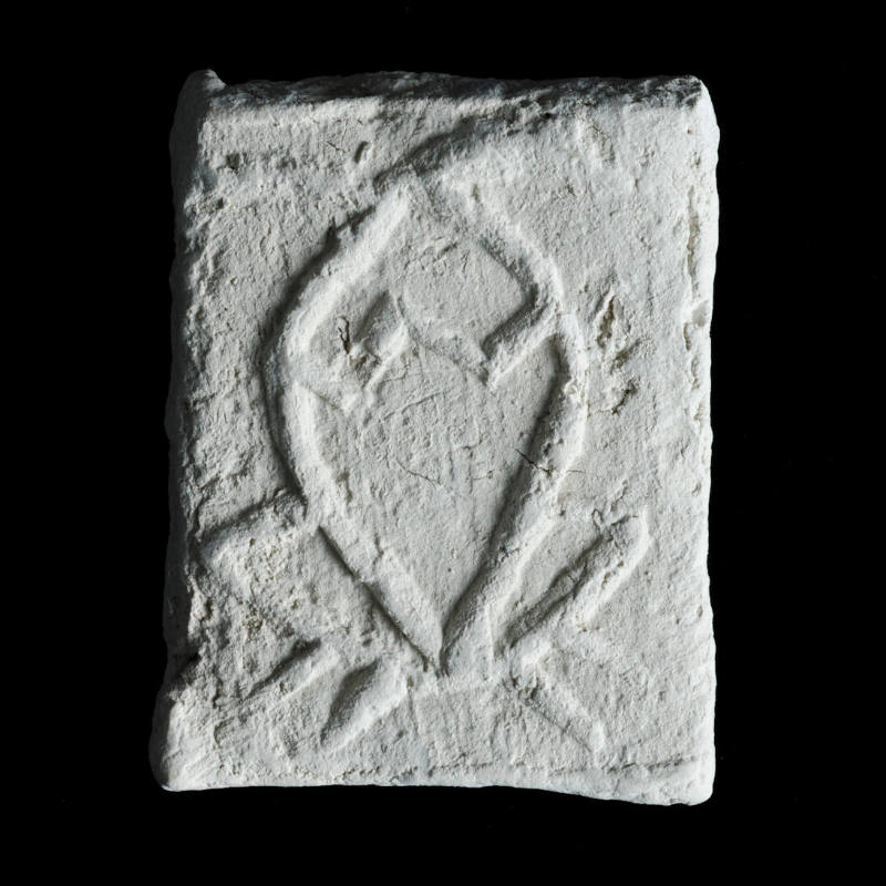 Sacred clay tablet with inverted teardrop shape