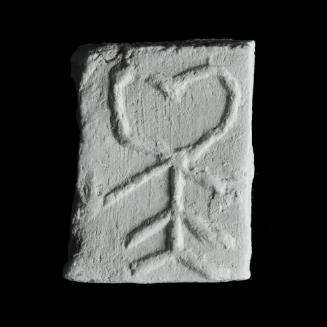 Sacred clay tablet with heart above sequence of three arrow shapes