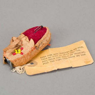 Moccasin pin cushion w/ tape measure