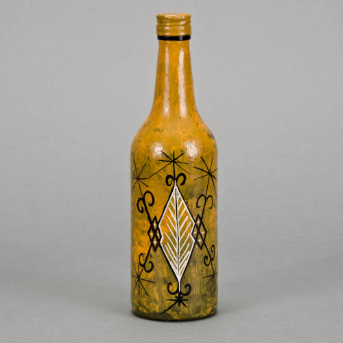 Aizan Velekete libation bottle